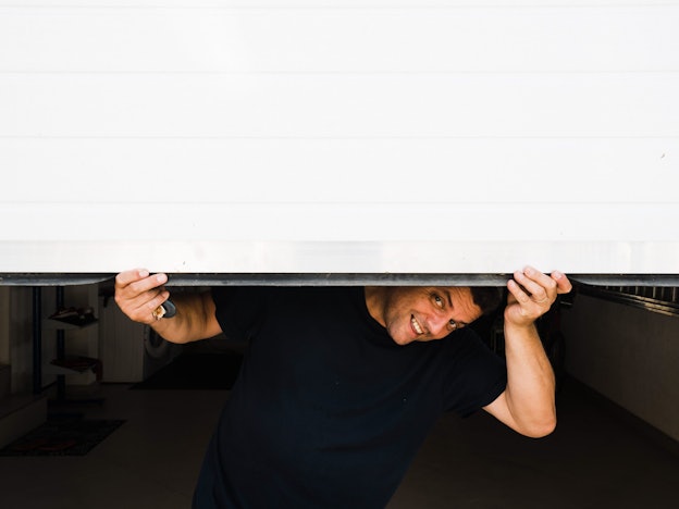 Header Image Holding Up Door